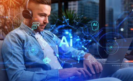Man infront of a laptop learning about AI